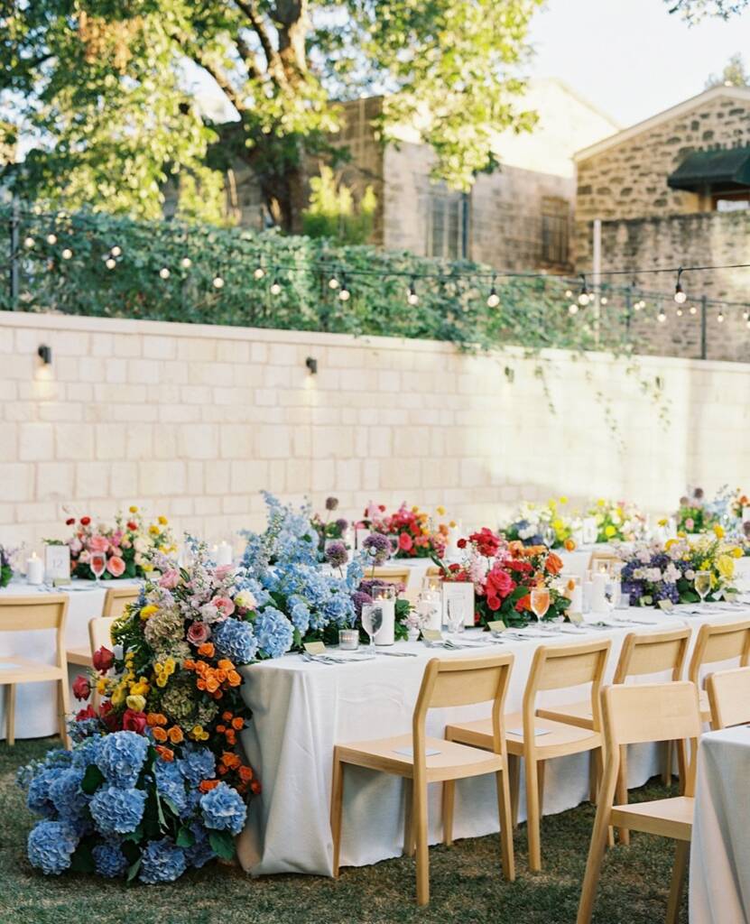 ⁠⁠A colorful Texas Hill Country dream for Alexis + Jace! 🎨⁠ ⁠ Combining timeless Western charm with a bold, ethereal